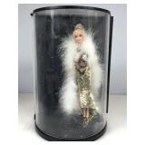 Barbie is dressed like a showgirl and the case is