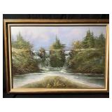 A framed landscape oil painting featuring a