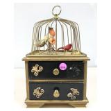 A vintage two drawer, musical jewelry box