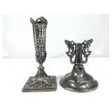 A pair of very ornate & fancy candleholders. And