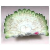 An antique green, opalescent glass brides basket