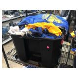 Bin of Golden State Warriors shirts and shorts,