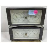 A pair of air guide portable barometers.  4 1/4