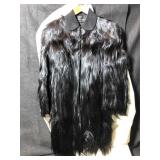 A vintage 1930s ladies black fur jacket also