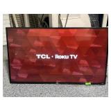 Roku TV TCL 4K 55in TV, model 55US57-W w/wall