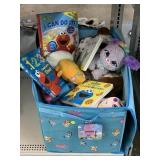Toy box with stuffed animals and Sesame Street