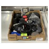 Assortment of items Bluetooth speakers headphones