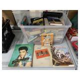 Storage containers full of books, the Elvis