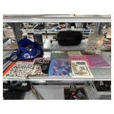 Crochet stitch books bag of poker playing cards,