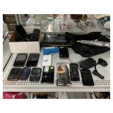 Large amount of cellphones and some wire