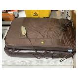 Portable massage mat with attached hand