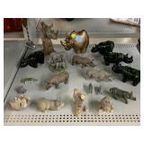 Collection of Rhino Figurines and Avon Aftershave