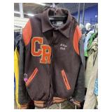 Varsity Jacket &. Womanï¿½s Sweater
