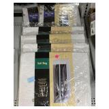 4 New Suit Bags and 2 Wardrobe Bags.