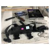 Assorted Knives, Holster, Handcuffs & More