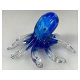 A hand blown small blue octopus.  5 1/2 inch