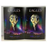 A pair of Eagles posters depicting their