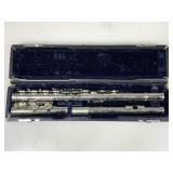A silver plated or silver student concert flute