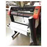 US Cutter Machine w/ White & Black Vinyl Rolls.