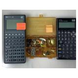 Box of three items one is an HP 35S scientific
