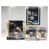 Four different pop rock figures in original
