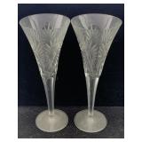 A pair of engraved champagne flutes with a 5