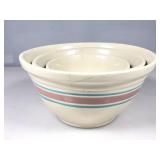 A graduating set of three McCoy pottery,
