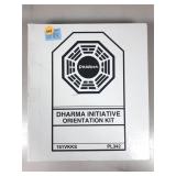 A white binder containing the Dharma initiative,