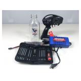 Four miscellaneous items related to Traxxas RC