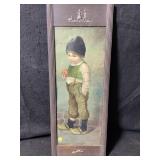 A framed vintage vertical wall hanging features a