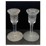 An engraved pear of matching candlestick holders