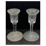 An engraved pear of matching candlestick holders