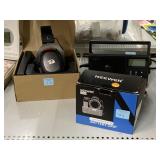 Camera Battery Grip, Gaming Headphones, and Raddy