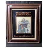 A framed vintage reproduction, print of Norman
