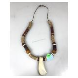 This is a handcrafted or tribal style beaded