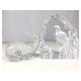 Two clear glass items one is a blown glass whale