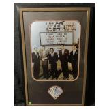Very tastefully matted and framed is the classic