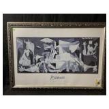 A framed reproduction print of Pablo Picassoï¿½s