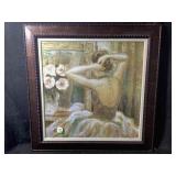 A framed print known as Tres Joli,  by artist,