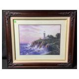 A framed print titled the light of peace by