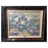 A framed cruel embroidery piece or print titled