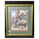 A framed double matted print featuring a still