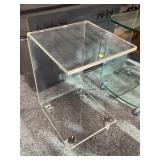 Round Plexiglass side table, on wheels, approx