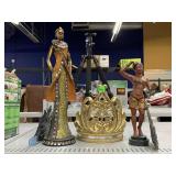 African Figurines and Queenï¿½s Crown Plant/Candle