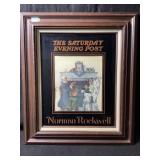 A framed vintage reproduction, print of Norman