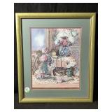 A framed double matted print featuring a still