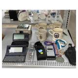 Variety of Electronics and Collectors Mugs.