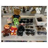 Variety of Sunglasses and Plush Toys.