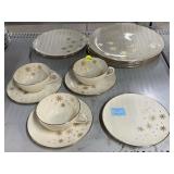Lenox Plates, saucers, and cups.