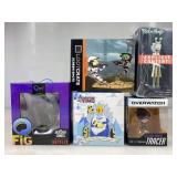 Lot of five adult type figurines still sealed in